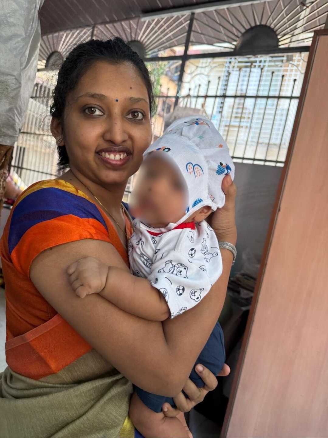 Flow 108 client with her baby
